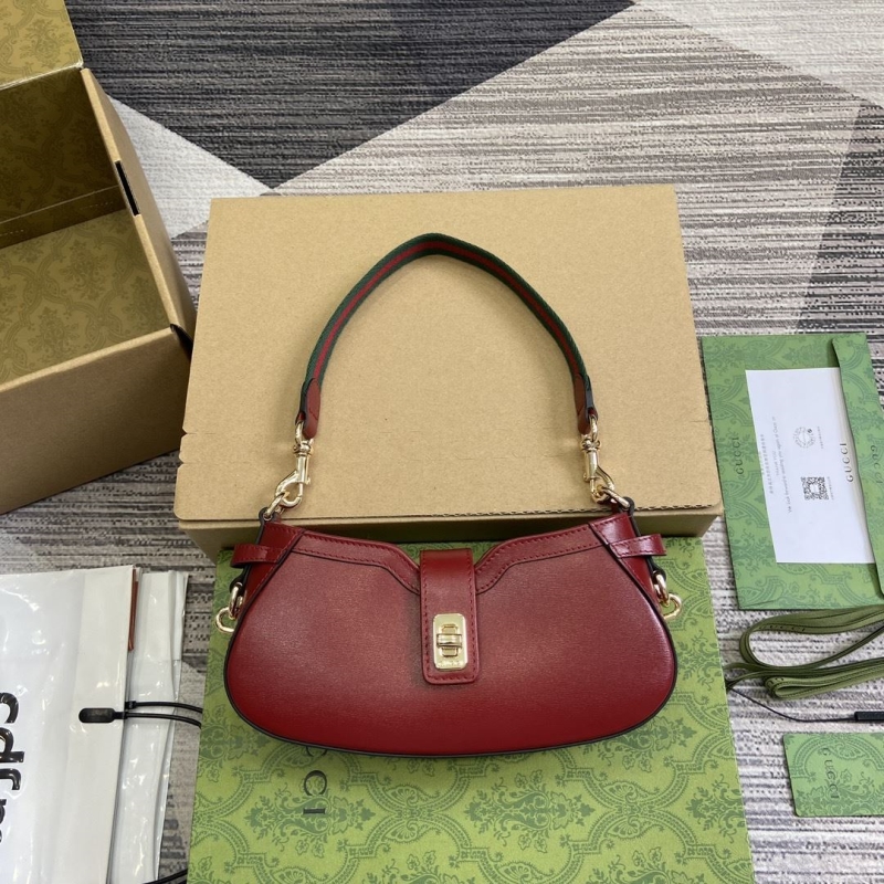 G*u*i top handle bags